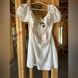 Kittenish romper white eyelet detail